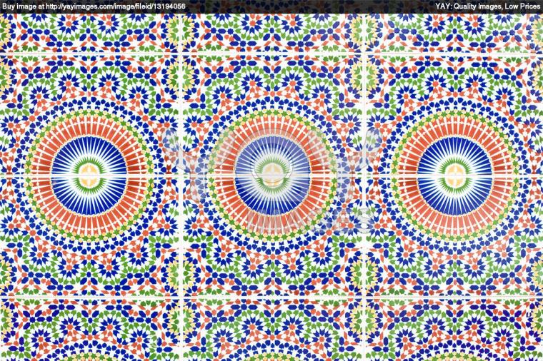 A stunning Moroccan tile mosaic wallpaper with a blend of colors and patterns