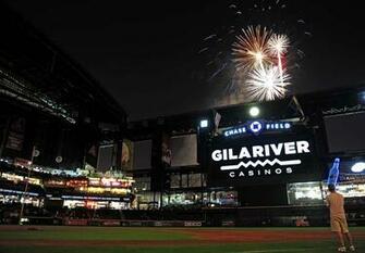 Phoenix Az July Fans Sit On The Field And Watch A Fireworks
