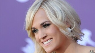 Carrie Underwood Face Closeup Side Pose Smiling Wallpaper