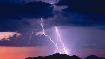 Lightning Bolt On The Top Of A Mountain Living And Dying In Peace