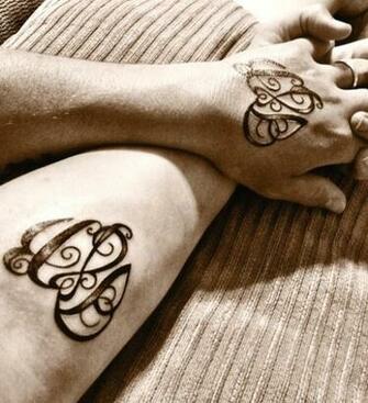 Matching Tribal Heart Tattoo For Couples Jpg