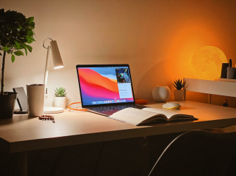 Macbook Pro On White Wooden Desk Photo China Image