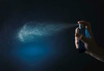 Fragrance Spray Particles Blue Background Commercial PhotoHDx