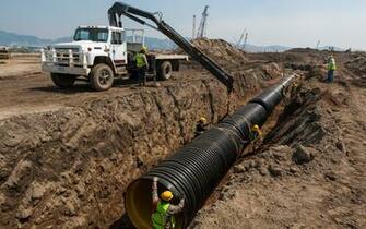 Trucks Pipes Mud Cranes Construction Wallpaper