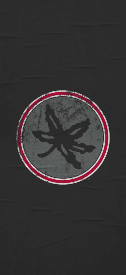 A Black Shirt With Red And White Logo Wallpaper