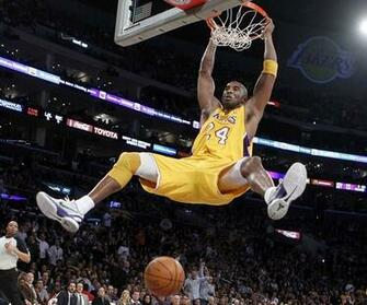 Lakers Bryant Slam Dunks Against The Kings During Their Nba