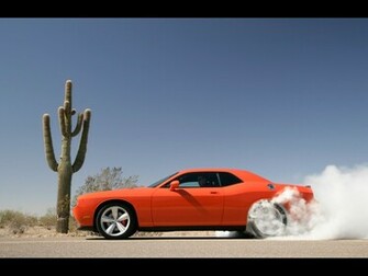 Dodge Challenger Srt8 Burnout Near Cactus Wallpaper