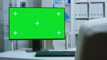 Dolly Shot Of Computer With Green Screen In Private Hospital And