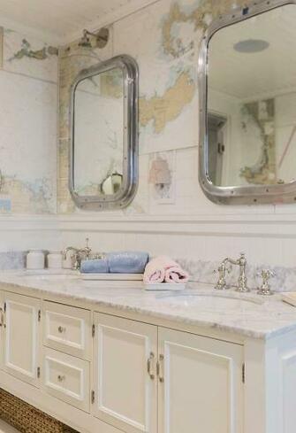 This Shared Kids Bathroom Features Vintage World Map Wallpaper