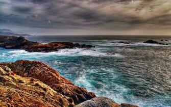 Sea Storm Clouds Before A Excitement Rocks Stock
