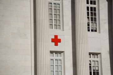 Red Cross On White Concrete Building Photo Image