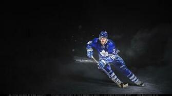 An Nhl Wallpaper Featuring Toronto Maple Leafs Defenseman Dion Phaneuf