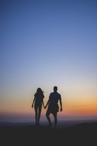 Couple Holding Hands Wallpaper On