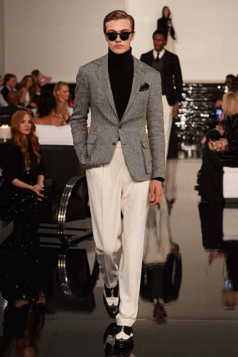Ralph Lauren Corporation Gray Coat Walking Wallpaper
