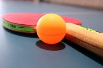 Table Tennis Ball And Racket On Ping Pong F5 Jpg