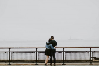 Couple Hugging Side By Wallpaper