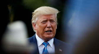 Trump Suggests Pairing Legislation To Strengthen Gun Background