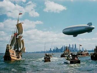 Photo Large Ship Entering A Harbor