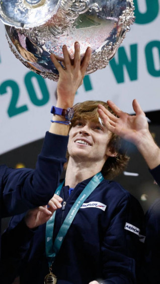 Andrey Rublev With Championship Trophy Wallpaper