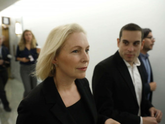 Kirsten Gillibrand Walking With Staff Wallpaper