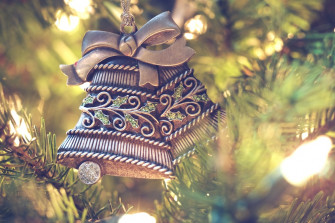 Brown Bell Hanging On Christmas Tree Photo Image