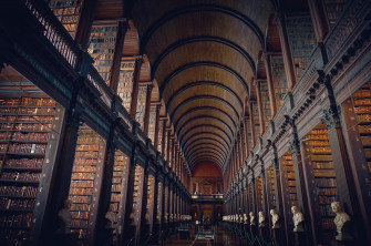 Shelves Of Books And Ornate Historic Ceiling Architecture In The Morgan Wallpaper