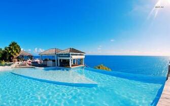 Resort On The Oceanside Wallpaper Beach