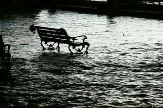 Bench Half Submerged On Water Image