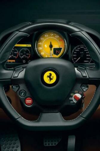 Red Ferrari With Logo Wallpaper Mobile Phone