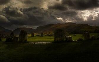 Wallpaper Field Rays Landscape Mountains Clouds Stones