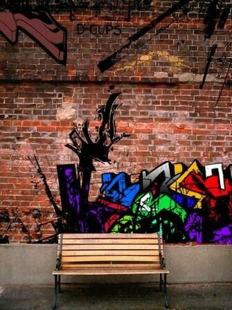 Graffiti On Brick Wall By Tamile