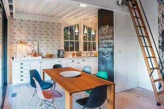 Wallpaper Accenting The Streamlined White Cabinetry Bright Colorful