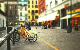City Street Bike Bicycle Parking Blurred Background Wallpaper