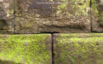 Wallpaper Background Of Large Stones Making Up The Sea Wall At Whitby