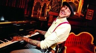 Travie Mccoy Backdrop Wallpaper