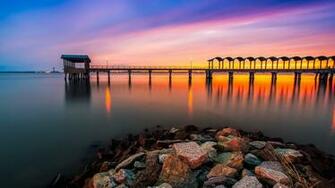 Mobile Pier Rocks Sky Wallpaper Water Background Image