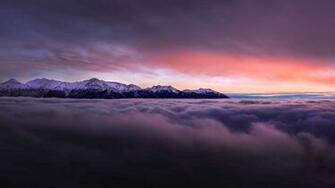 Sunset With Mountains Above Clouds 4k Wallpaper