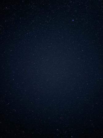 A Magical Sky Full Of Blue Stars Wallpaper