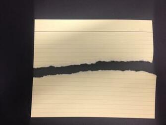 Paper Torn Across Horizontal Plane