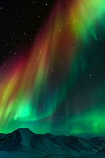 The Symphony Of Northern Lights Wallpaper For iPhone