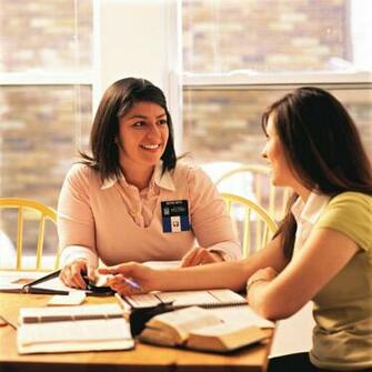 Sister Missionaries Studying
