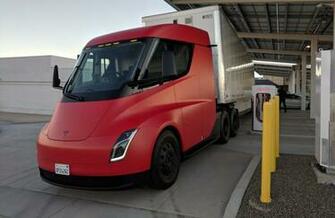 Tesla Wraps Matte Black Semi Prototype In Stunning Red Amid