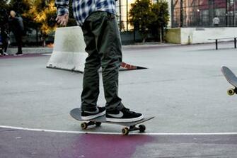 Person Riding Skateboard Golf Attire Swing