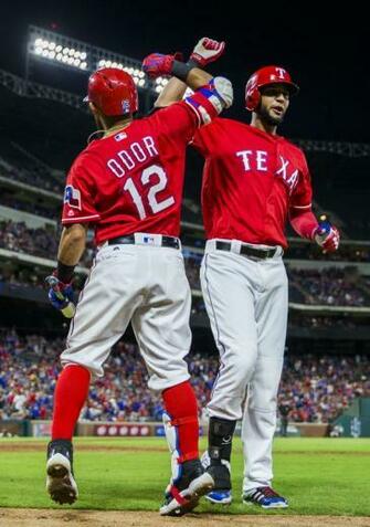 Texas Rangers Second Baseman Rougned Odor High Fives Right