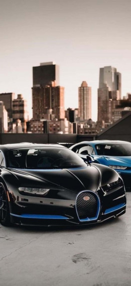 The Iconic Bugatti And Innovative iPhone Xs Working In Perfect Wallpaper