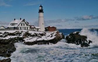 Lighthouse On A Rough Seashore In Winter High Quality