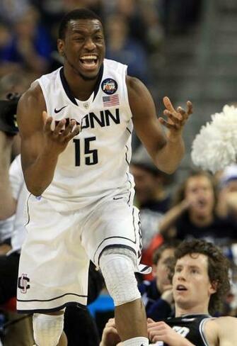 Kemba Walker Of The Connecticut Huskies Reacts After