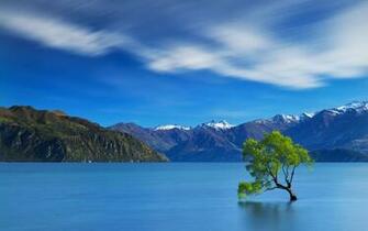 Serene Mountain Lake Wallpaper Glass