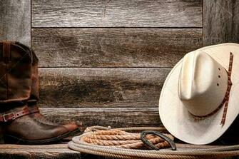 Cowboy Hat With Authentic Western Lariat Lasso And Roper Leather Boots