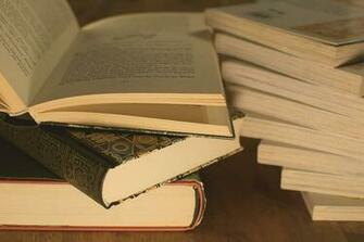 HD Wallpaper Pile Of Assorted Title Books On Brown Surface